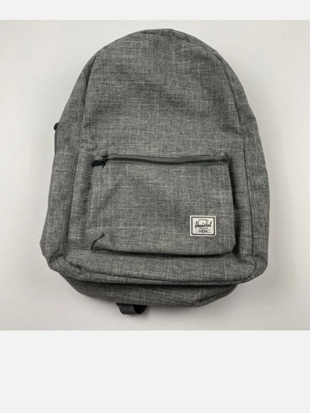 The Herschel Mini Backpack In Grey Color Striped Interior Blk Dots